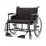 Cadeira de rodas Jaguaribe Super Big, vista lateral. Estrutura em aço pintado de preto, com rodas grandes e argolão prateado. O assento reforçado e o encosto são visíveis.