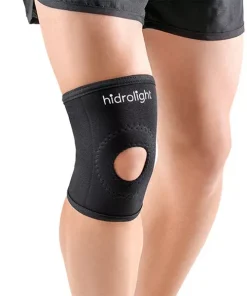 Joelheira curta Hidrolight preta, unissex, feita de neoprene, com orifício central para a patela e fechos aderentes ajustáveis.